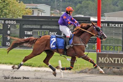Funny Photo and jockey Sophie Engerran wired the field in the RUS Championship Final at Monticello Raceway