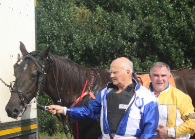 Horses in "Indian File " at the Ballabuidhe Race Track