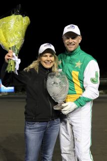 Driver Jody Jamieson celebrates Jula Shes Magic’s victory in the 2019 two-year-old trotting filly Super Final with trainer Susanne Kerwood