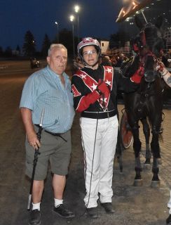 Owner, breeder Andre Laroque with driver Marie Claude Auger and Onyx VA