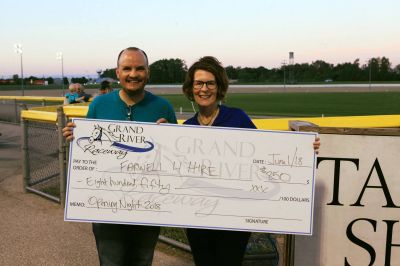 Cheque Presentation: Mike Farwell with Kelly Spencer (Mgr. Marketing & Communications, Grand River Raceway)