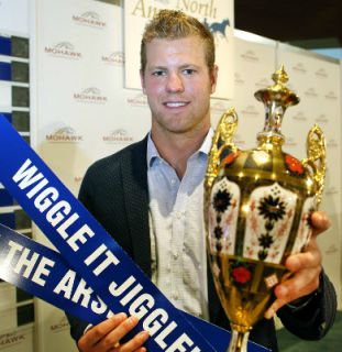 Peter Holland of the Toronto Maple Leafs poses for a photo with the Pepsi North America Cup